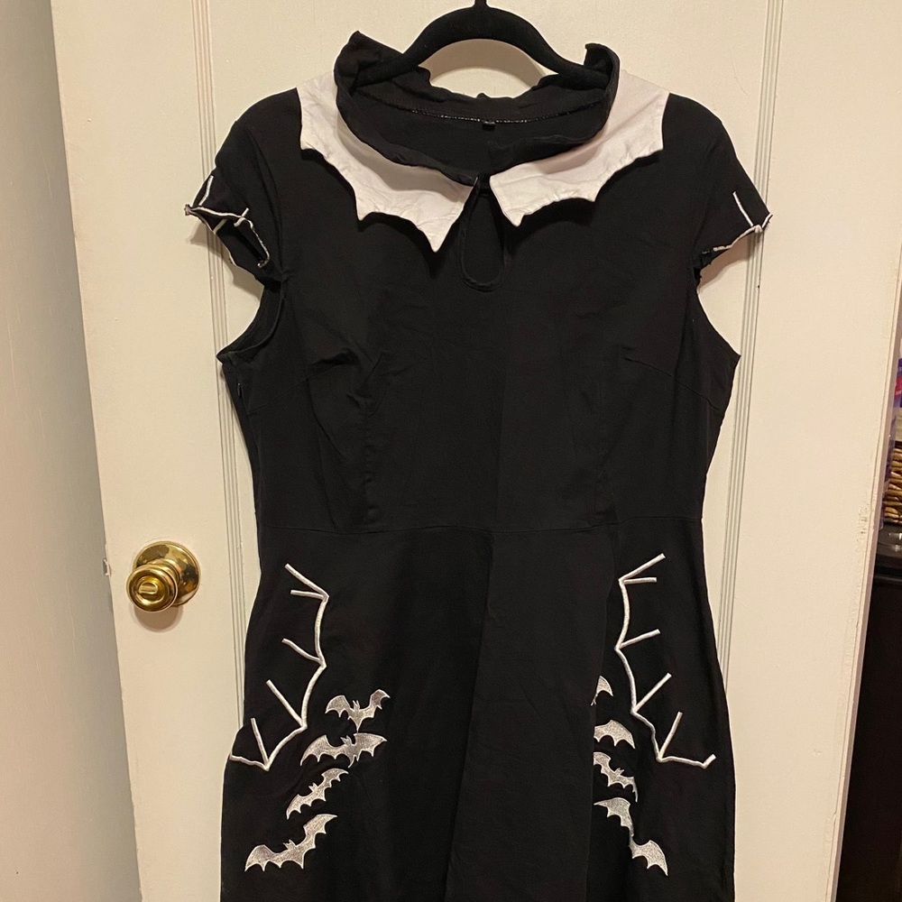 Dress with spider webs and bats